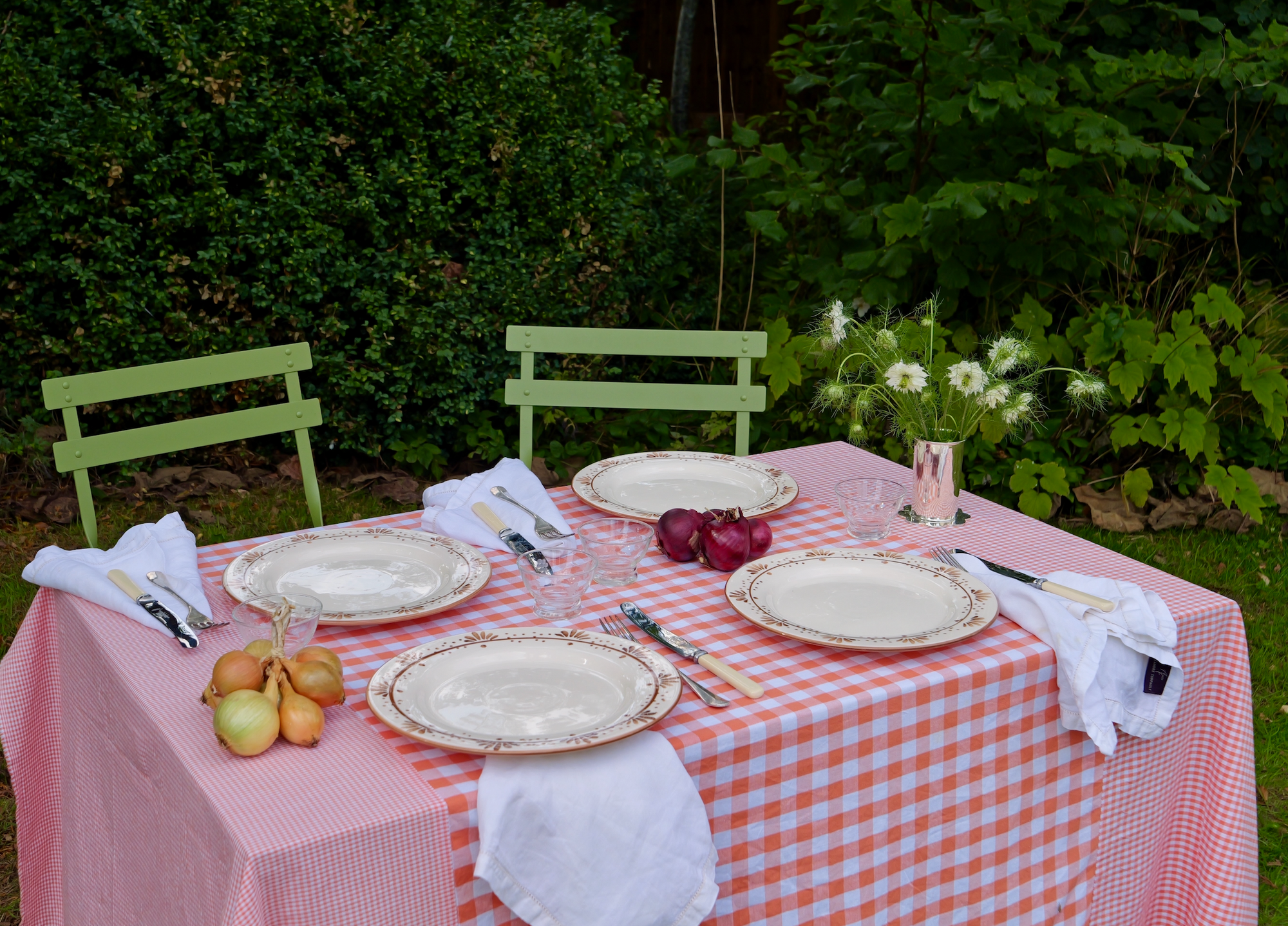 hand-stitched orange patchwork gingham tablecloth