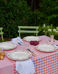 hand-stitched orange patchwork gingham tablecloth