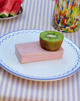 Handmade rectangular stoneware egg cup in a pink finish. Artisanal design with a minimalist aesthetic, perfect for serving soft-boiled eggs. Unique handcrafted texture and earthy tone, ideal for rustic or modern kitchen décor.