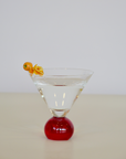 Set of two handcrafted cocktail glasses with red bobble stems, ideal for martinis and aperitifs – elegant barware from Marla Primrose.