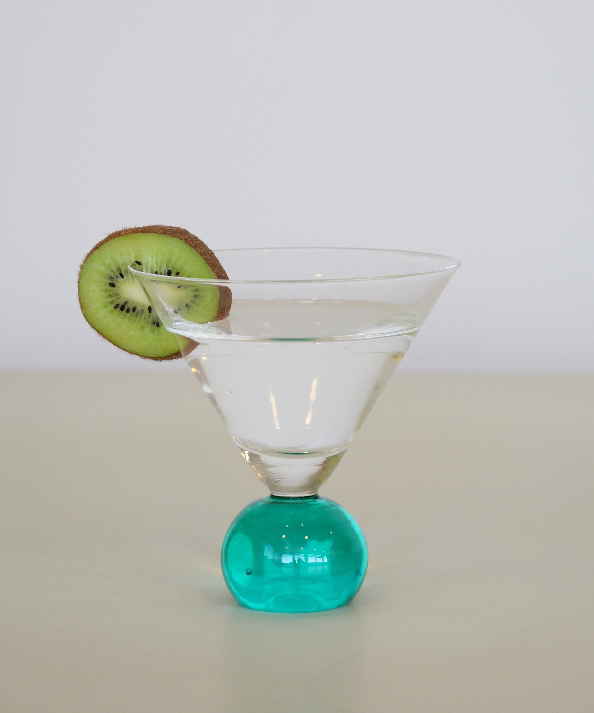 Set of two handcrafted cocktail glasses with green stems, ideal for martinis and aperitifs – elegant barware from Marla Primrose.