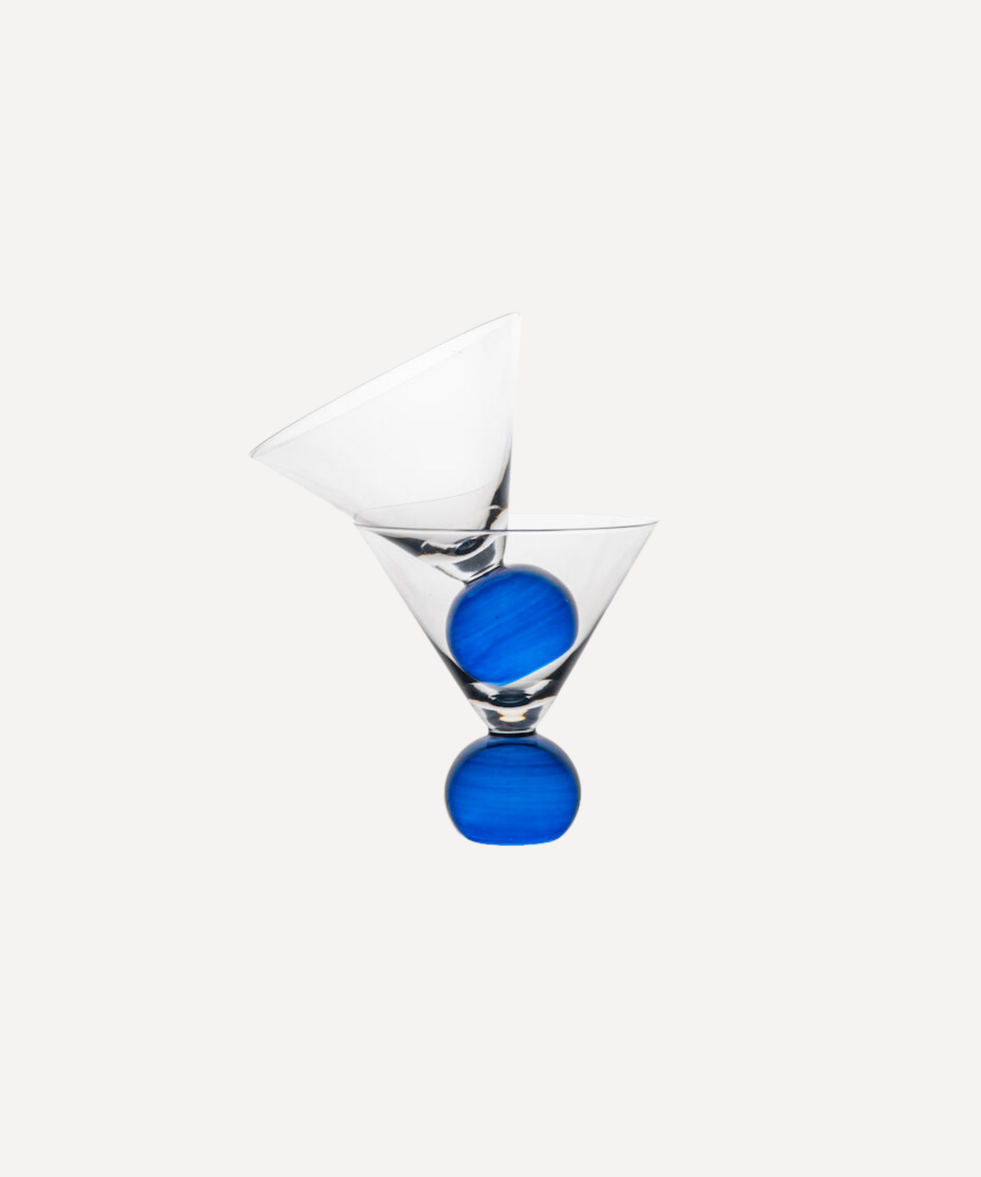 Set of two handcrafted cocktail glasses with blue bobble stems, ideal for martinis and aperitifs – elegant barware from Marla Primrose.